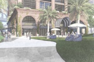 Architectural rendering of proposed arched brick theatre and hotel building