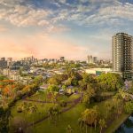 Aerial dawn render of Solais Residences above Newstead Park and the Brisbane River
